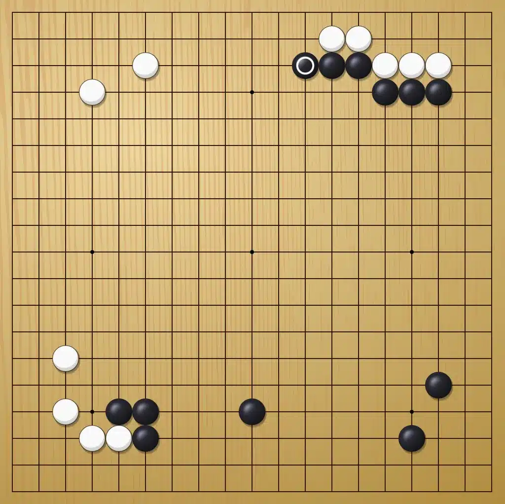 Goban avec pierres dans les coins - choisir un territoire précis et l'assumer, méthode Kadoban